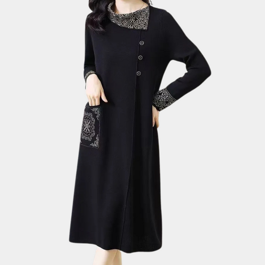 Schwarzes Damenkleid mit Spitze, Knöpfen und Tasche, elegantes Design, langärmelig.