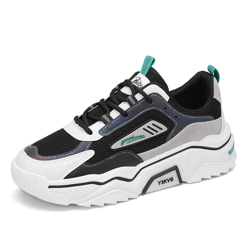 Schwarz-weißer Sneaker, atmungsaktives Mesh, sportliches Design, Herrenmode, Freizeitschuh.