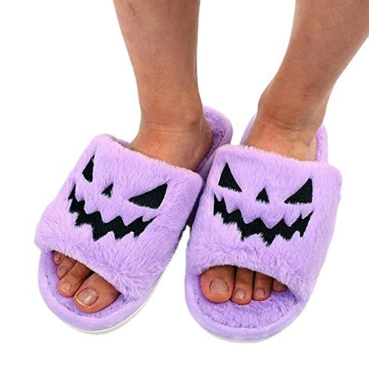 Lila Plüsch-Hausschuhe mit Kürbisgesicht, Halloween-Design, Damenmode.