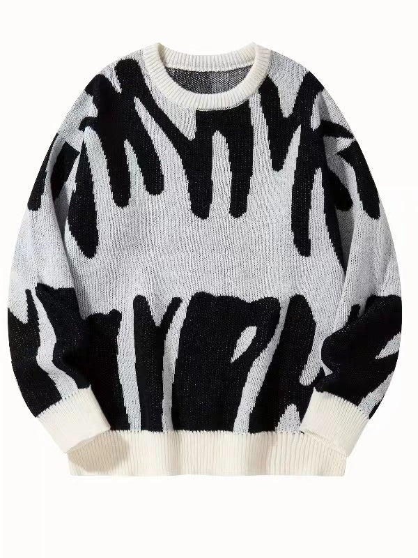 Strickpullover mit abstraktem Muster in Schwarz auf cremeweißem Grund, flach von vorn gezeigt 6
