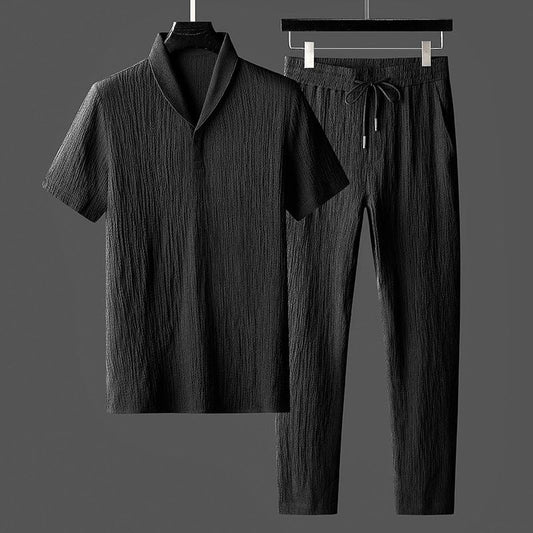 Schwarzer Herren-Pyjama-Set, kurzärmeliges Hemd und Hose, aus Baumwolle, elegant und bequem.