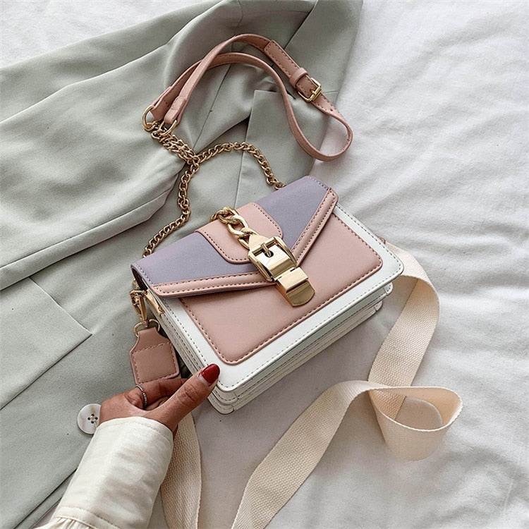 Damenhandtasche aus Leder, dreifarbig, mit Kettengurt und Schnalle, modisch und elegant.