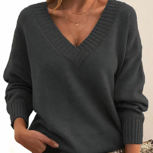 Damenpullover V-Ausschnitt, dunkelgrau, Strick, Herbstmode, lässig, langärmlig, elegant.