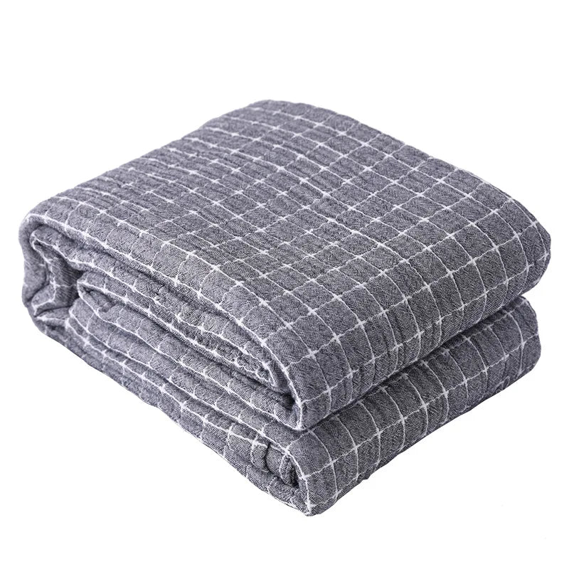 Graue karierte Decke aus Baumwolle, weiches Material, ideal für Wohnzimmer oder Schlafzimmer.