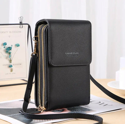 Schwarze Lederhandtasche mit Reißverschlüssen und Schulterriemen, elegant und modern.