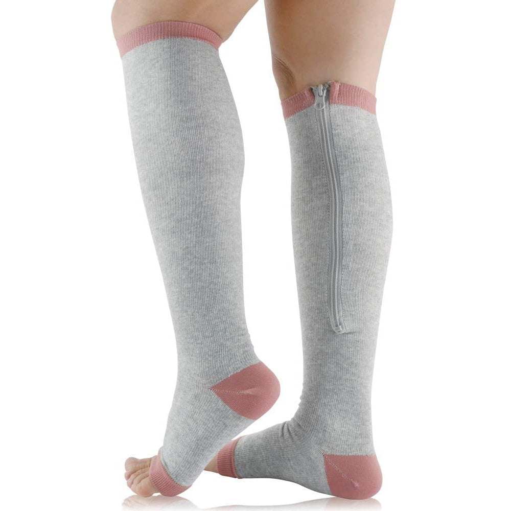 Graue Kompressionsstrümpfe mit Reißverschluss, rosa Akzente, Kniestrümpfe, Damenmode.