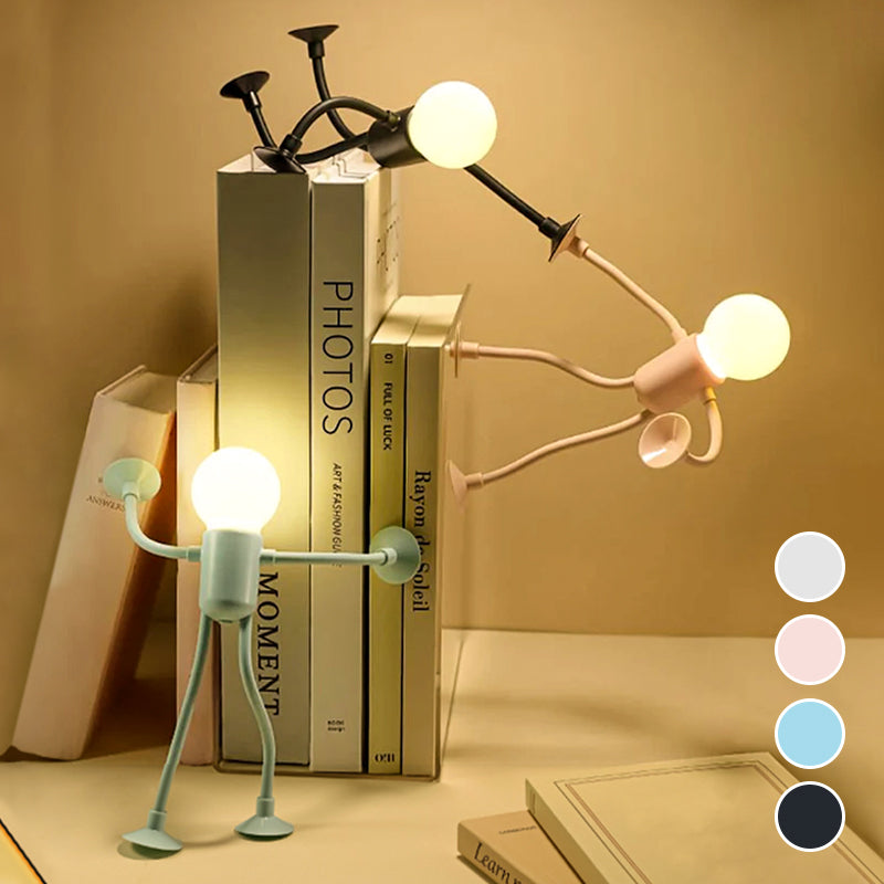 Drei Männchen-Lichter in Grün, Rosa und Schwarz klettern und stützen sich an einem Bücherstapel; rechts vier Farbmuster zur Auswahl. 5