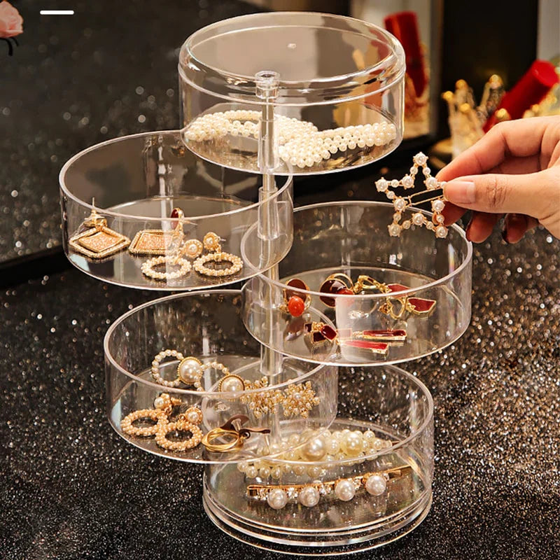 Transparenter Schmuck-Organizer aus Acryl mit mehreren Ebenen, ideal zur Aufbewahrung von Ohrringen.
