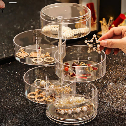 Transparenter Schmuck-Organizer aus Acryl mit mehreren Ebenen, ideal zur Aufbewahrung von Ohrringen.