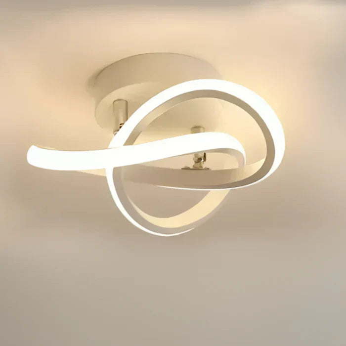 Moderne LED-Deckenleuchte, weiß, geschwungenes Design, energiesparend, Wohnzimmerbeleuchtung.