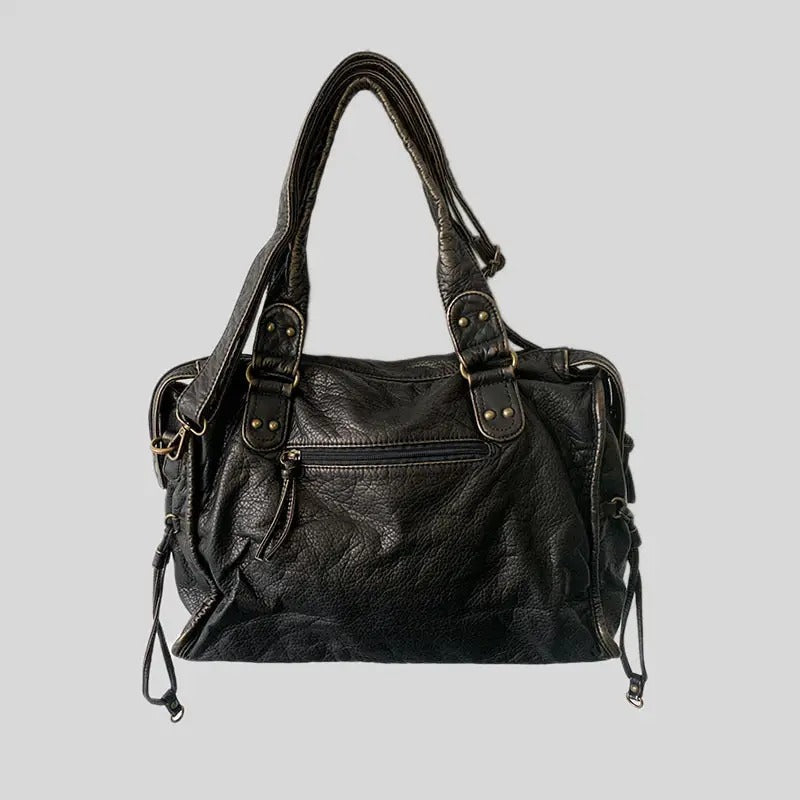 Schwarze Lederhandtasche mit Reißverschluss, modisch, Damenaccessoire, elegant, robust.