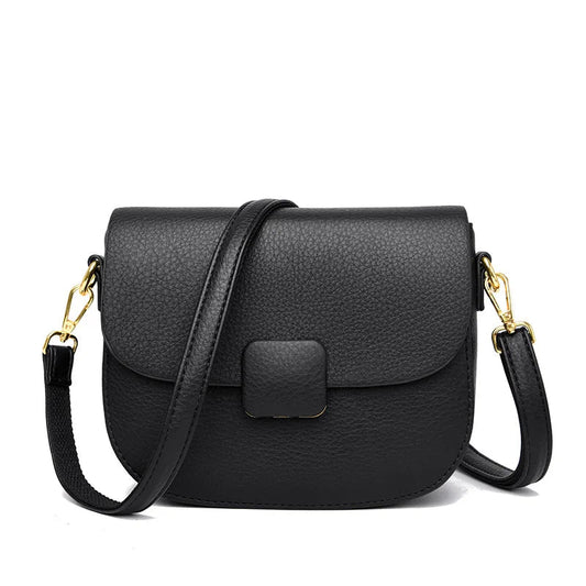 Schwarze Leder-Umhängetasche mit goldenen Details, elegante Damenhandtasche.