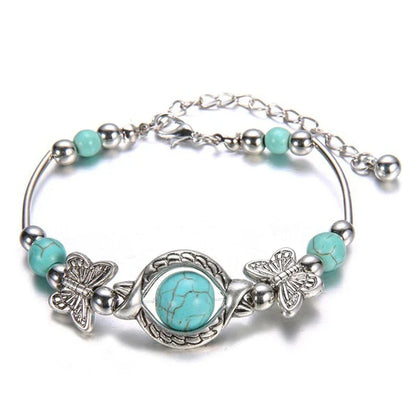 Silberarmband mit türkisfarbenen Perlen und Schmetterlingsanhängern, verstellbar, Damen-Schmuck.