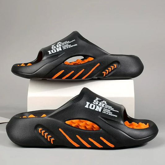 Schwarze und orange Badeschlappen, rutschfest, ergonomisch, Unisex, Freizeitmode.