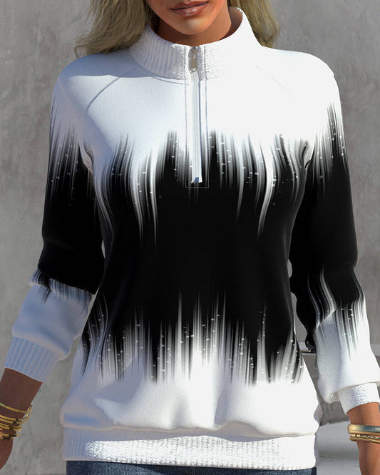 Damenpullover mit Reißverschluss, schwarz-weiß, abstraktes Muster, langärmelig, modisch.