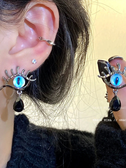 Ohrring mit blauem Auge und schwarzem Tropfenanhänger, modisches Accessoire, Damen-Schmuck.