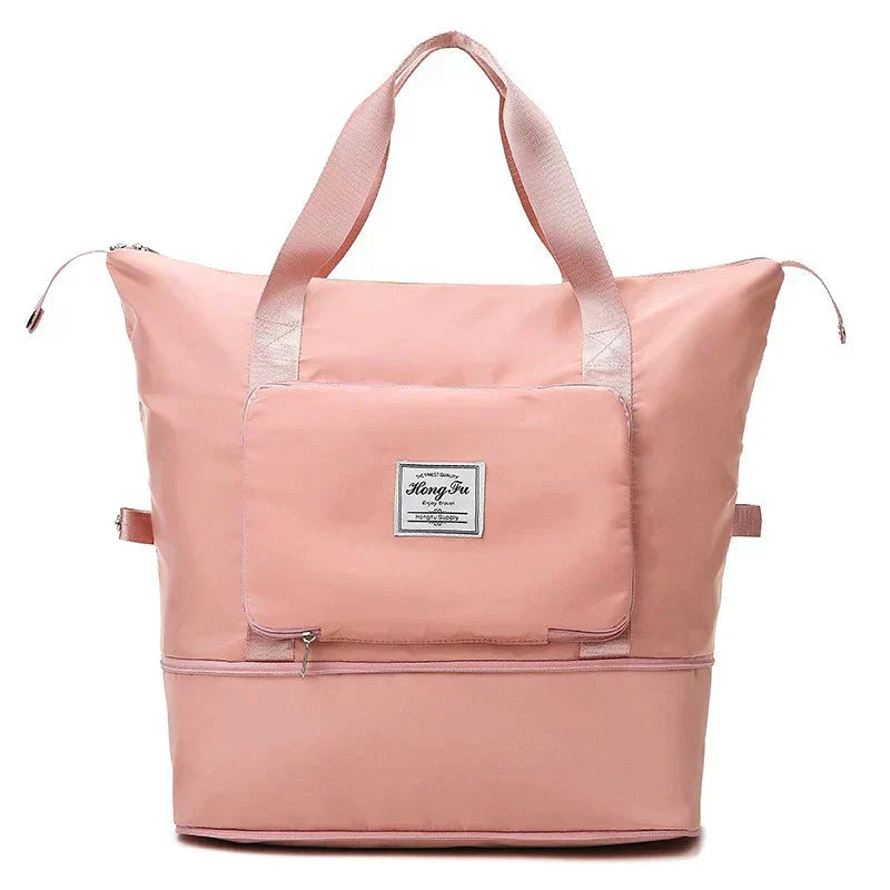 Rosa Reisetasche aus Nylon mit Reißverschluss, groß, für Damen, mit Tragegriffen.