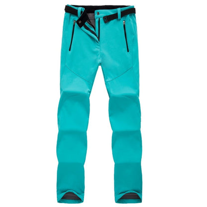 Türkise Outdoorhose, wasserdicht, mit Reißverschlusstaschen und Gürtel, für Herren.