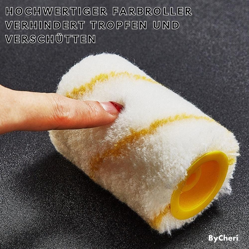 Ersatzwalze mit weißem Flor und gelben Streifen, ein Finger drückt in die weiche Oberfläche, gelber Kern sichtbar. 7
