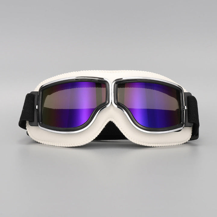 Fliegerbrille mit cremeweißer Polsterung und Chromrahmen, die Gläser schimmern violett-blau verspiegelt. 15
