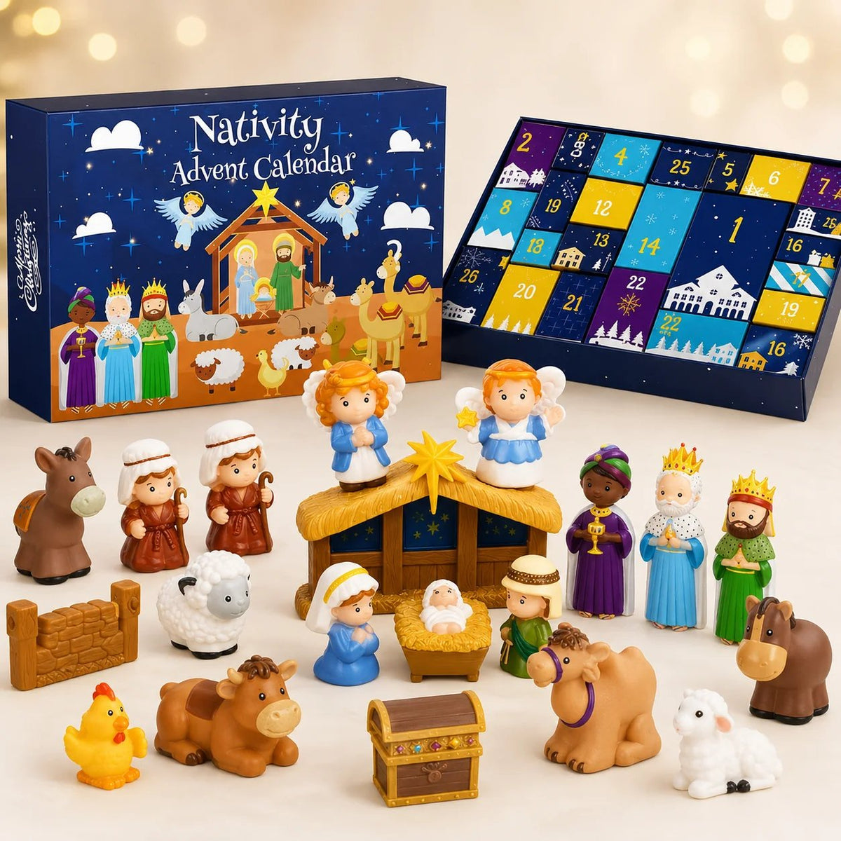Schachtel und geöffneter Kalender mit allen Krippenfiguren, Tieren, Stall und Zaun vor hellem Hintergrund 2