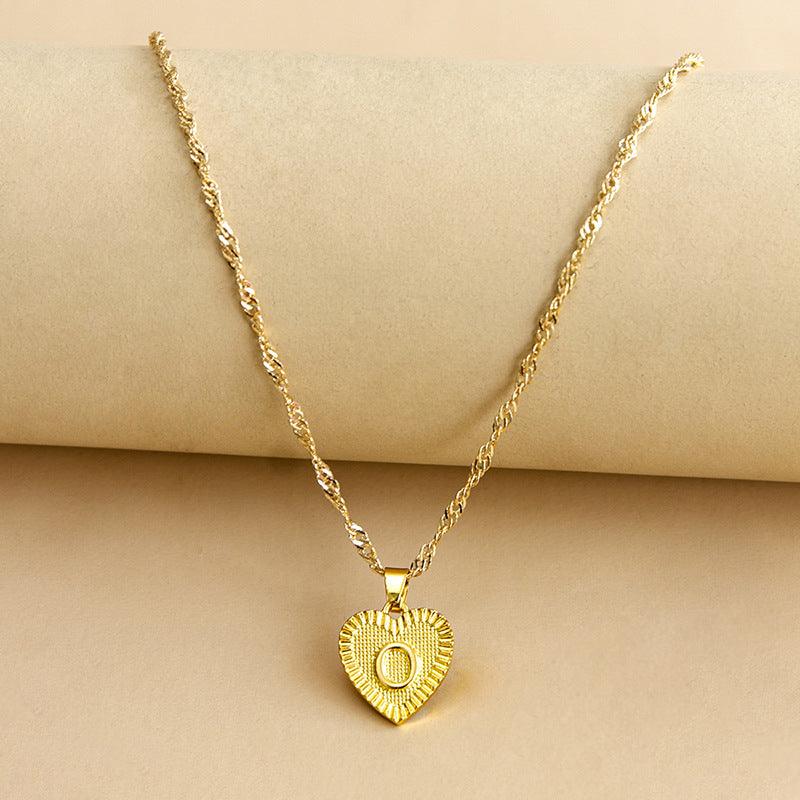 Goldene Herz-Halskette mit Buchstabenanhänger, gedrehte Kette, eleganter Schmuck für Damen.