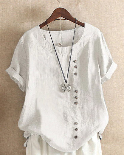 Weiße Leinenbluse mit asymmetrischer Knopfleiste und Rundhalsausschnitt, Damenmode.