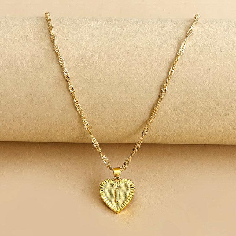 Goldene Herz-Halskette mit gedrehtem Kettenmuster, eleganter Schmuck für Damen.