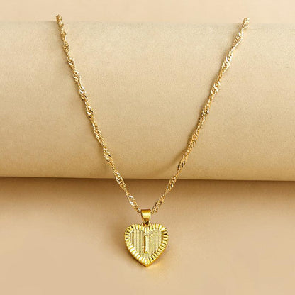 Goldene Herz-Halskette mit gedrehtem Kettenmuster, eleganter Schmuck für Damen.