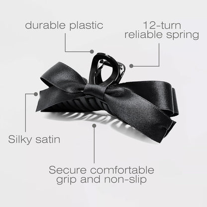Schwarze Haarklammer mit Satin-Schleife, langlebigem Kunststoff, rutschfestem Griff.