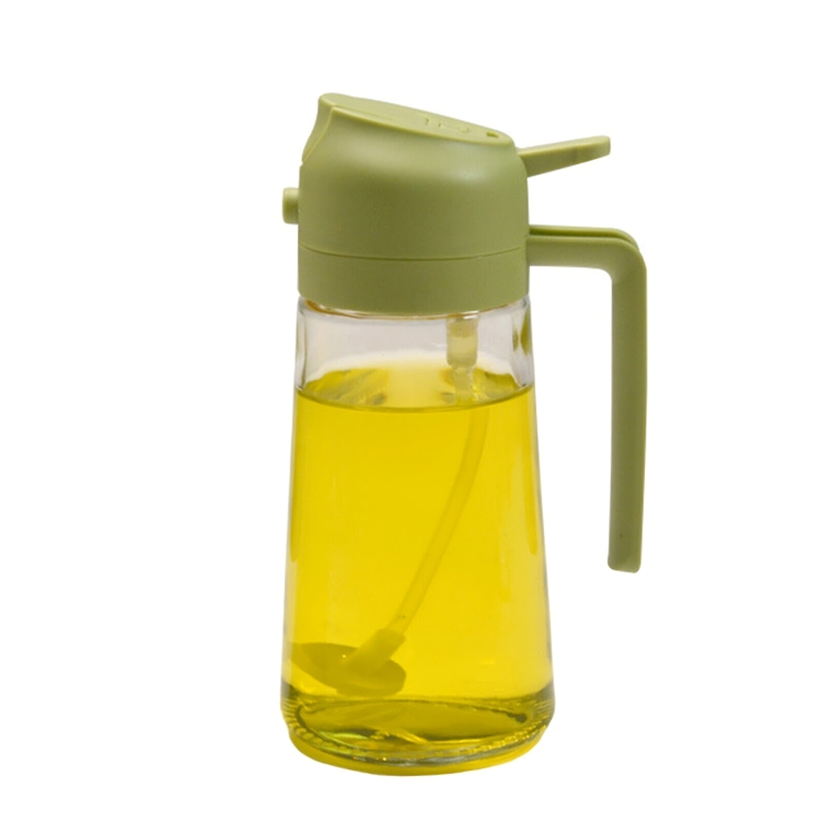 Grüner Ölspender aus Glas mit Griff, ideal für Küche, Essig oder Öl, modernes Design.