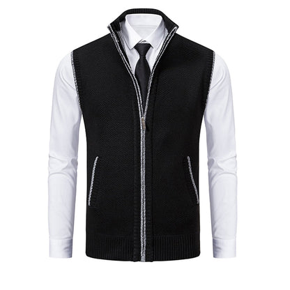 Schwarze Herrenweste mit Reißverschluss, elegantes Design, über weißem Hemd und Krawatte.
