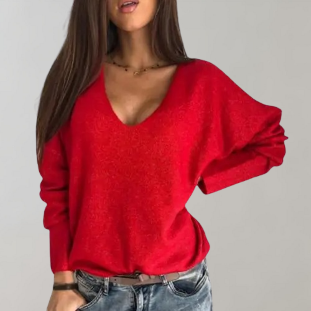 Frau in rotem Pullover, V-Ausschnitt, lässig, modisch, Damenmode, Herbstkleidung.