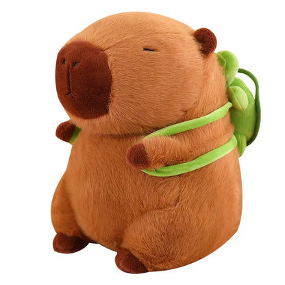 Kuscheltier Capybara braun mit grünem Rucksack, Plüschtier, Geschenkidee, Kinderzimmer-Deko.
