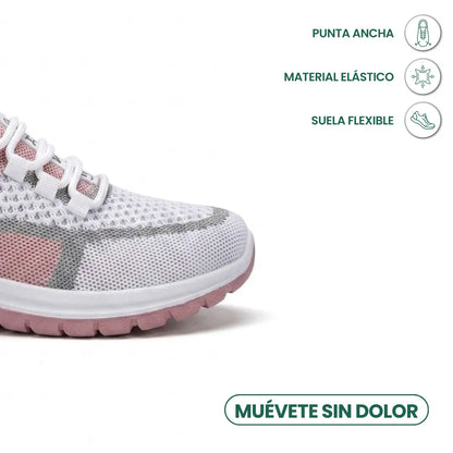 Nahaufnahme der breiten Schuhspitze des weiß-rosa Mesh-Sneakers mit Symbolen für weite Zehenbox, elastisches Material und flexible Sohle. 23
