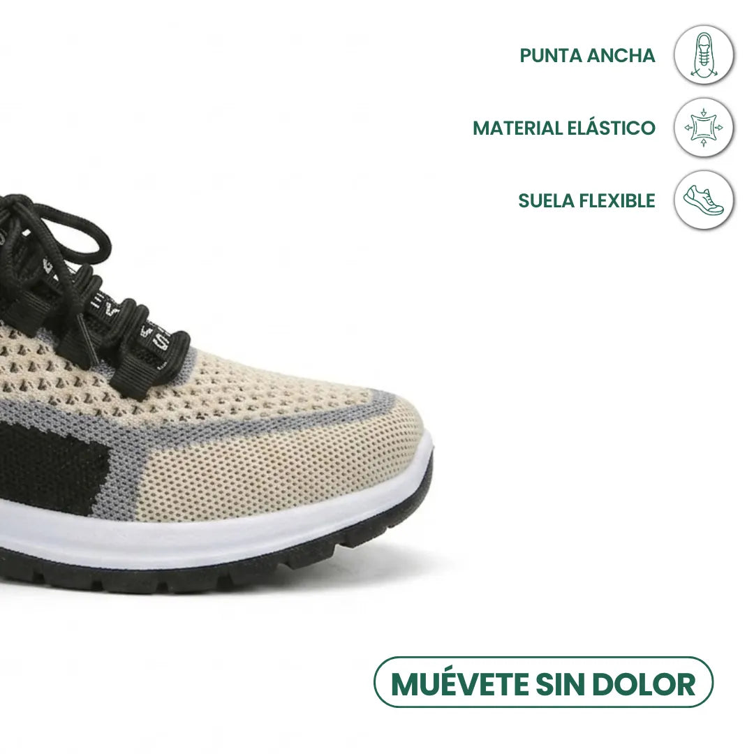 Nahaufnahme der breiten Schuhspitze eines beigen Mesh-Sneakers mit schwarzen Schnürsenkeln, grauen Akzenten und weißer Sohle, daneben Symbole zu Zehenraum, Elas 41