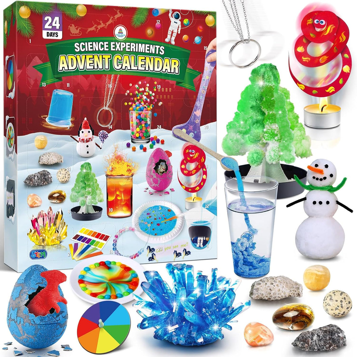 Roter Adventskalender mit den Experimentier-Teilen davor: Kristallbaum, Schlangenspirale über Teelicht, Schneemann, Dino-Ei, blauer Kristall und Edelsteine. 4