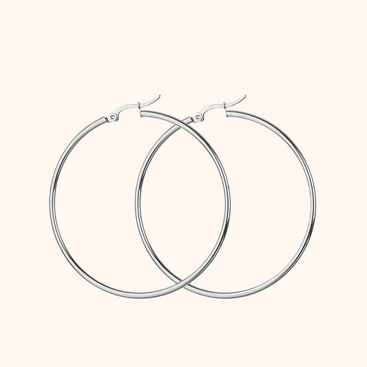 Silberne Creolen Ohrringe, Edelstahl, minimalistisches Design, modischer Schmuck für Damen.
