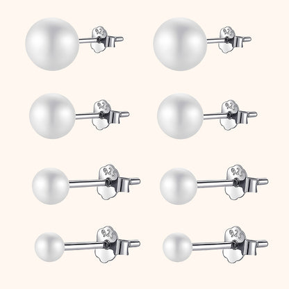 Neun Paar silberne Perlenohrringe, runde Form, glänzend, Schmuck für Damen.