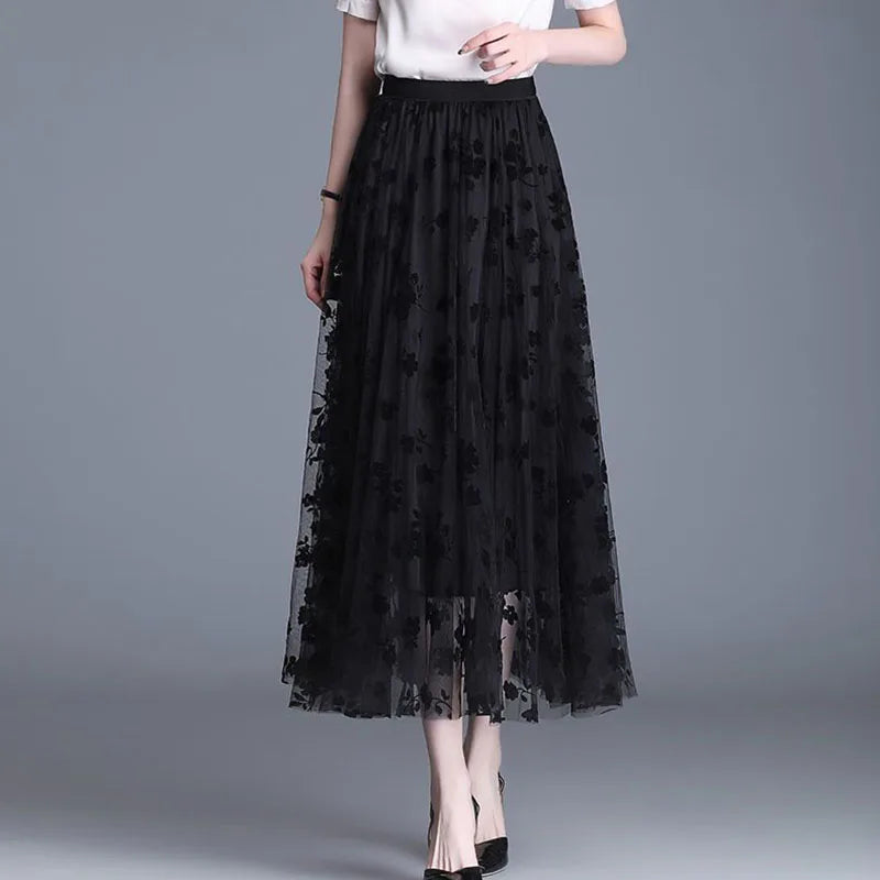 Schwarzer Damen-Mesh-Rock, elegant, Midi-Länge, florales Muster, modisch, vielseitig.