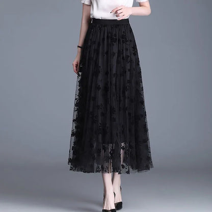 Schwarzer Damen-Mesh-Rock, elegant, Midi-Länge, florales Muster, modisch, vielseitig.