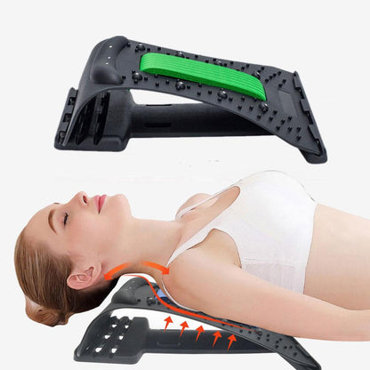 Rückenstrecker Massagegerät, schwarz-grün, zur Linderung von Rückenschmerzen, Frau liegend.