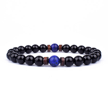 Schwarzes Onyx-Armband mit blauer Lapislazuli-Perle und Holzdetails, elastisch, Unisex-Schmuck.