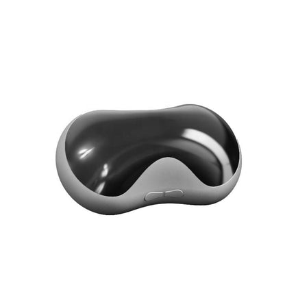 Graues ergonomisches Nackenkissen aus Memory-Schaum, ideal für Reisen und Entspannung.