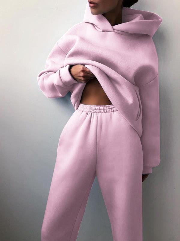 Damen rosa Hoodie und Jogginghose Set, bequem, Freizeitkleidung, weiches Material.