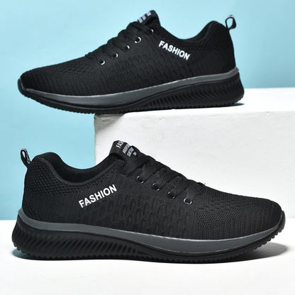Schwarze Herren-Sneaker, atmungsaktiv, modisch, mit Schriftzug "FASHION", ideal für Sport.