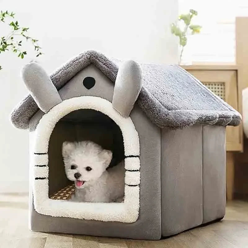Graue Hundehütte aus Plüsch mit abnehmbarem Kissen, geeignet für kleine Hunde und Katzen.