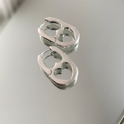 Silberne Ohrringe in Tropfenform, modisches Design, Damen-Schmuck, glänzende Oberfläche.