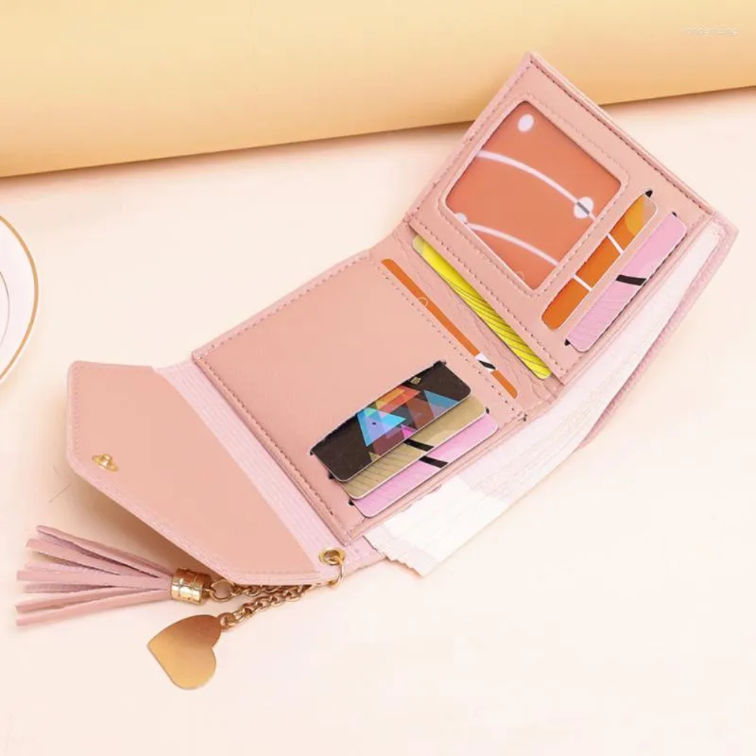 Rosa Mini-Geldbörse mit Quastenanhänger, Kartenfächer, Damen-Accessoire, elegant.