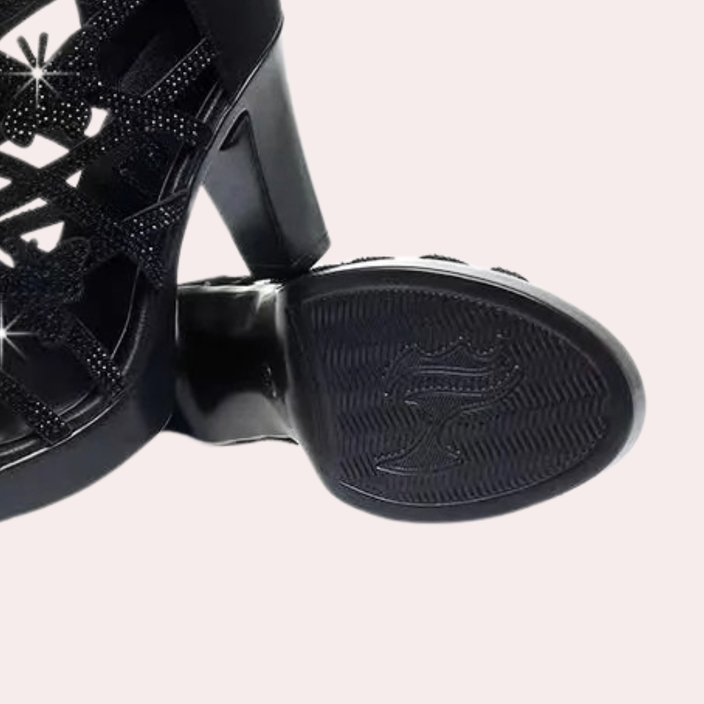 Schwarze Damenpumps mit Glitzer, hoher Absatz, elegantes Design, rutschfeste Sohle.